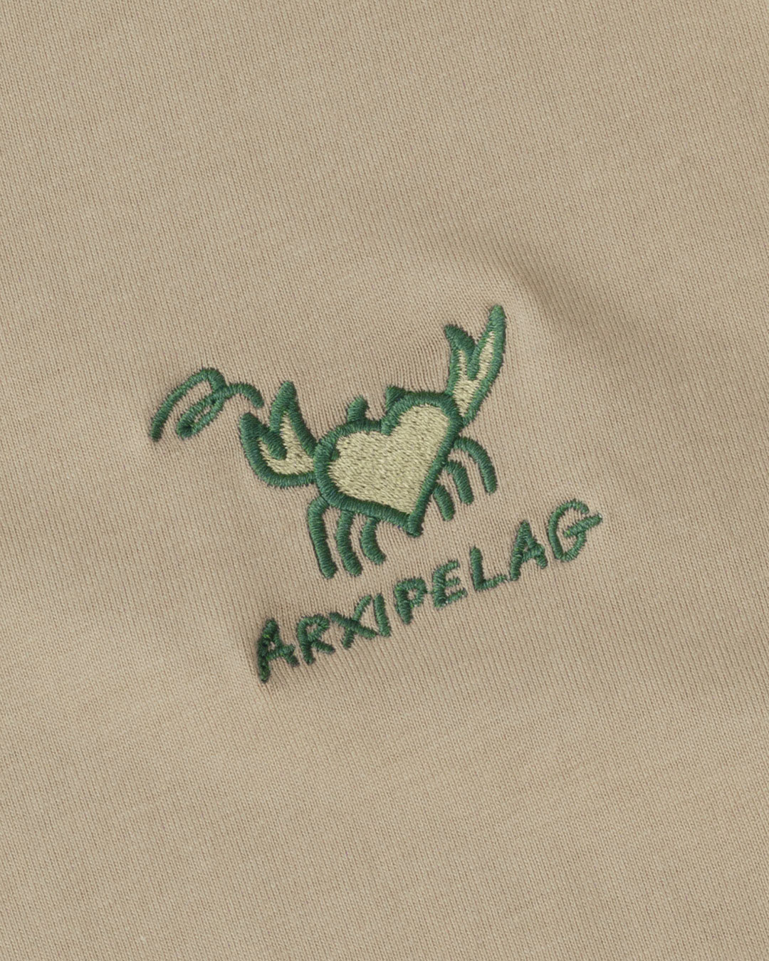 https://arxipelag.com/wp-content/uploads/2026/04/arxipelag-olga-prader-tshirt-crab-detail-.jpg