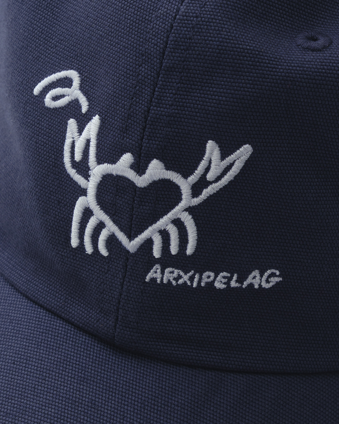 https://arxipelag.com/wp-content/uploads/2026/05/arxipelag-olga-prader-hat-crab-navy-detail.jpg